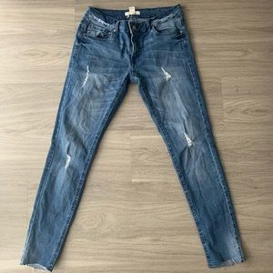 Light blue cut skinny jeans
